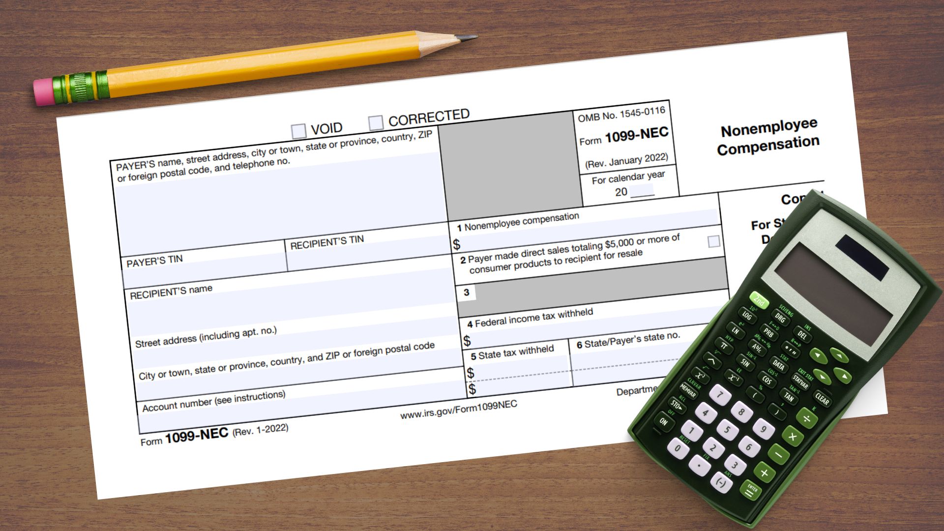 The copy of the 1099-NEC tax form for nonemployee compensation with the calculator and the pencil